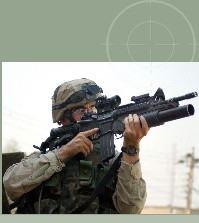 Army Soldier fielding M4 with M203 attachment. 