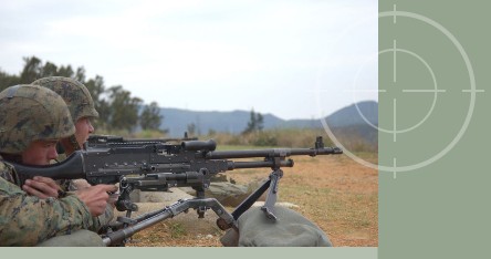 United States Marines firing M240B medium action machine gun during training excercises for Operation Iraqi Freedom. M-240B machine guns can be stored in Combat Crew Served Weapons Storage Racks with the bi-pod attached to the weapon.