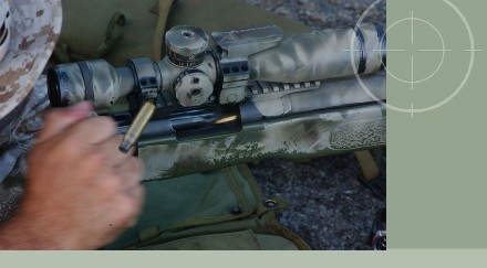 United States Marine firing M40A3 sniper rifle during training excercises for Operation Iraqi Freedom. M-40 sniper rifles can be stored in Combat Weapons Storage Racks with the bi-pod attached to the weapon.