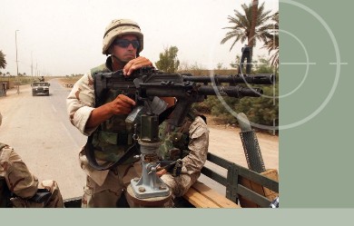 United States Army Soldier firing M60 during training excercises for Operation Iraqi Freedom. M-60 machine guns can be stored in Combat Weapons Racks with the bi-pod attached to the weapon.